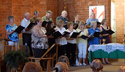 alpine community church choir alpine community church choir standing and singing the anthem