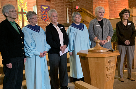 six women being installed as officers of the women's guild
